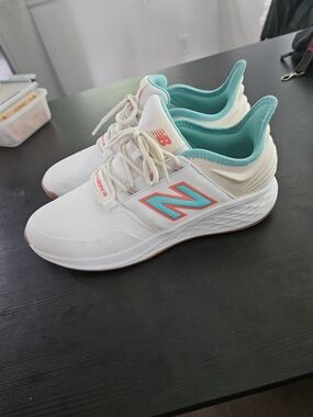 New Balance Women’s White Sneakers with Teal and Coral Accents